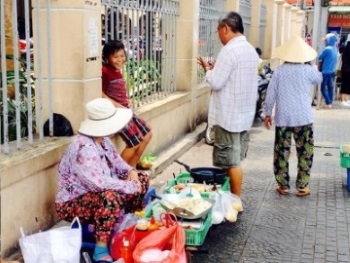 street hawker in Ho Chi Minh City - captured by Thy Lai street hawker in Ho Chi Minh City - captured by Thy Lai