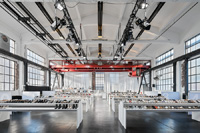 Into the harsh charm of the former industrial hall, Dart integrates a reduced spatial presentation.