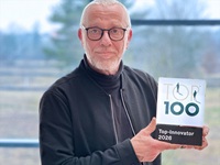 Ralf Ritzert, cab Head of Marketing, and the 2026 award