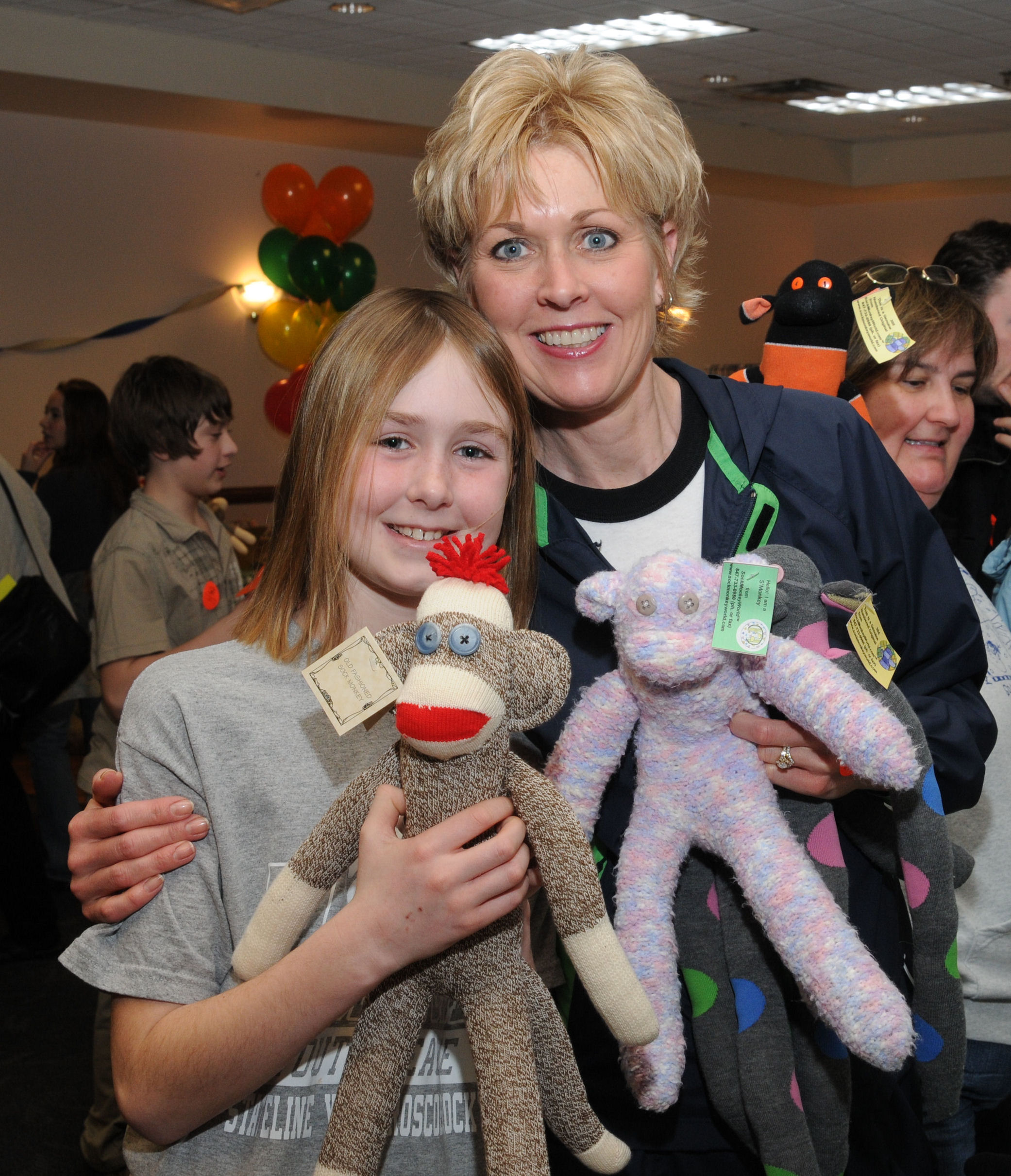 Echte Sock Monkey Fans: Mutter und Tochter bei der Sock Monkey Madness in Rockford