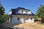 Dieses Einfamilienhaus vom Typ „Rügen“ kann am Wochenende im Panketal besichtigt werden.