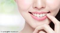 Lückenloses Lächeln dank einem Implantat oder einer Brücke / © ryanking999 – Fotolia.com Lückenloses Lächeln dank einem Implantat oder einer Brücke / © ryanking999 – Fotolia.com