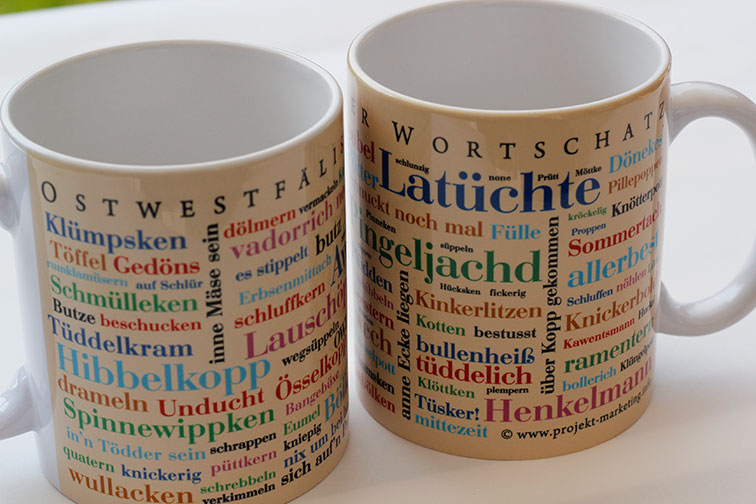 Keramikbecher mit ostwestfälischen und emsländischen Wortschätzen Keramikbecher mit ostwestfälischen und emsländischen Wortschätzen