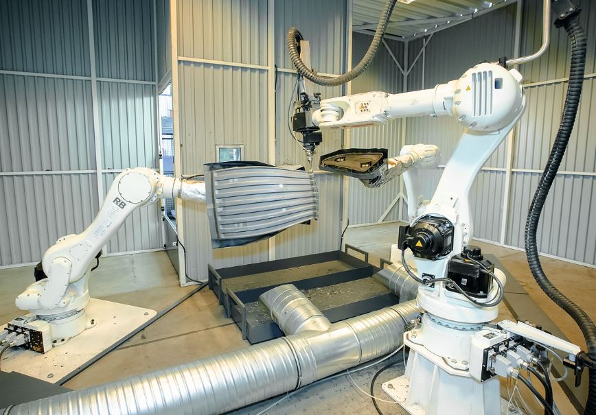Bei Solvaro sorgen drei Roboter für Tempo beim Laserschneiden