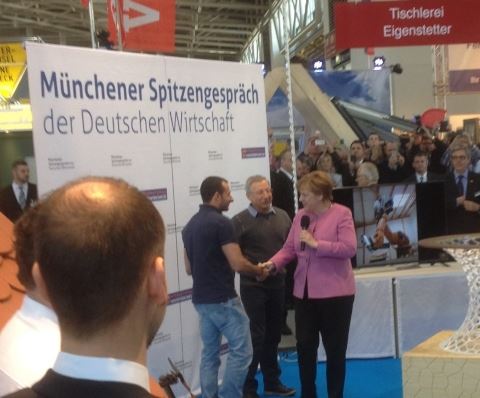 Martin Eigenstetter, Axel Eigenstetter, Angela Merkel Martin Eigenstetter, Axel Eigenstetter, Angela Merkel
