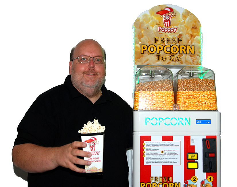 Gründer und Geschäftsführer Harald Krämer mit dem ersten Popppy-Popcorn-Automaten. Gründer und Geschäftsführer Harald Krämer mit dem ersten Popppy-Popcorn-Automaten.