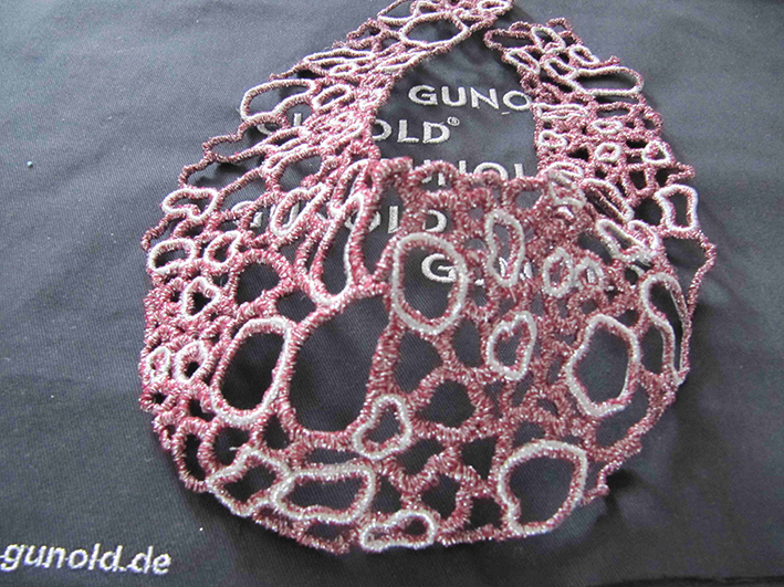 gestickt mit Mety - dem innovativen Garn von Gunold, Stockstadt gestickt mit Mety - dem innovativen Garn von Gunold, Stockstadt