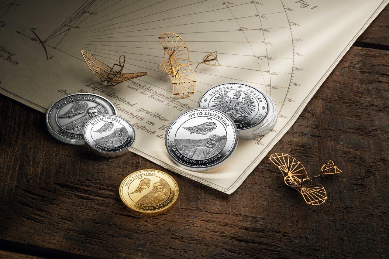 Degussa Otto Lilienthal 125 Jahre Menschenflug_Gold und Silber Thaler mit Modell (Bildquelle: Deguss