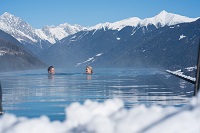 Skypool im Winter mit Aussicht auf die Berge (Alpin Panorama Hotel Hubertus) Skypool im Winter mit Aussicht auf die Berge (Alpin Panorama Hotel Hubertus)