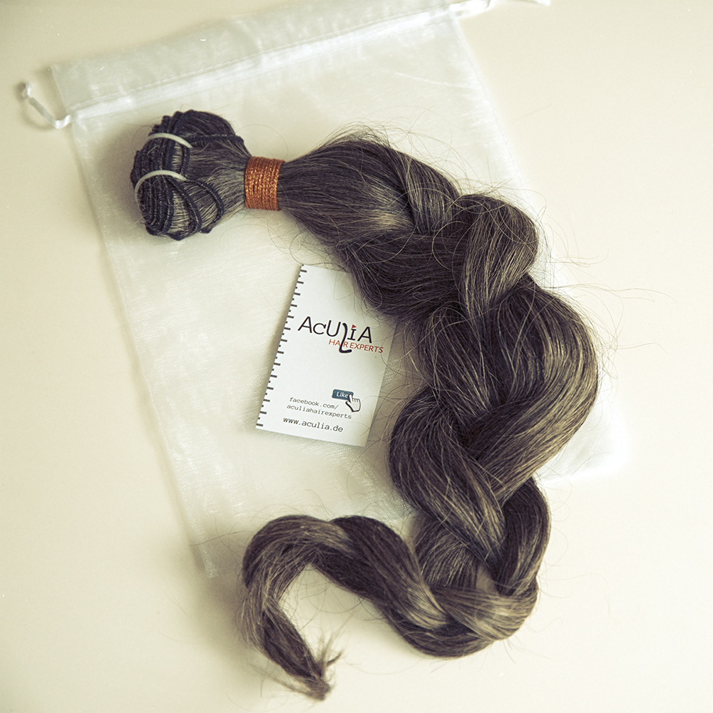 Extensions als Echthaar-Tresse: Gut zum schonenden Einarbeiten mit der Hairweaving-Methode (Quelle: Extensions als Echthaar-Tresse: Gut zum schonenden Einarbeiten mit der Hairweaving-Methode (Quelle: