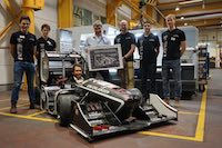 Michael Eisler, MBA, Mitglied der WEILER-Geschäftsführung, am Steuer des Rennautos (Foto: WEILER)