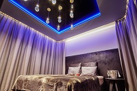 Suite mit Doppelbett und Beleuchtung (Bayerwaldresort Hüttenhof) Suite mit Doppelbett und Beleuchtung (Bayerwaldresort Hüttenhof)