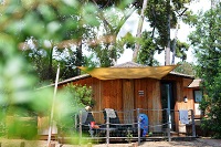 Außenansicht eines Chalets (Paradù Tuscany EcoResort)