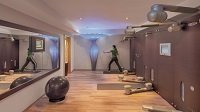 Frau beim Training im Fitnessbereich (c) Wellnessresidenz Alpenrose (Sporthotel Alpenrose Residenz)