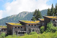 Aussenansicht im Sommer vom Feriendorf Hohentauern (Alps Residence) Aussenansicht im Sommer vom Feriendorf Hohentauern (Alps Residence)