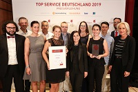 Eine besondere Ehrugn für das Team von Protection One (Foto: ServiceRating GmbH)