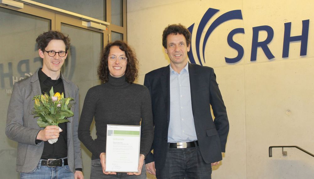 Rektor Prof. Dr. Lars Meierling (rechts) und Dekan Prof. Dr. Johannes Emmerich gratulieren Prof. Dr. Rektor Prof. Dr. Lars Meierling (rechts) und Dekan Prof. Dr. Johannes Emmerich gratulieren Prof. Dr.