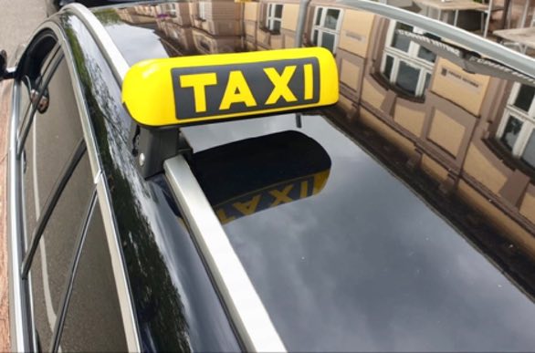 Im Taxi durch Baden-Baden mit Maske.