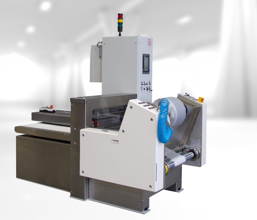 Die von Wickert Maschinebau entwickelte Coil-Station für Gummi (Foto: Wickert Maschinenbau GmbH). Die von Wickert Maschinebau entwickelte Coil-Station für Gummi (Foto: Wickert Maschinenbau GmbH).