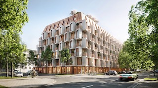 Die Fassade besticht durch Formsprache und einen Dualismus von Metall und Glasfaserbeton. © Bauwerk