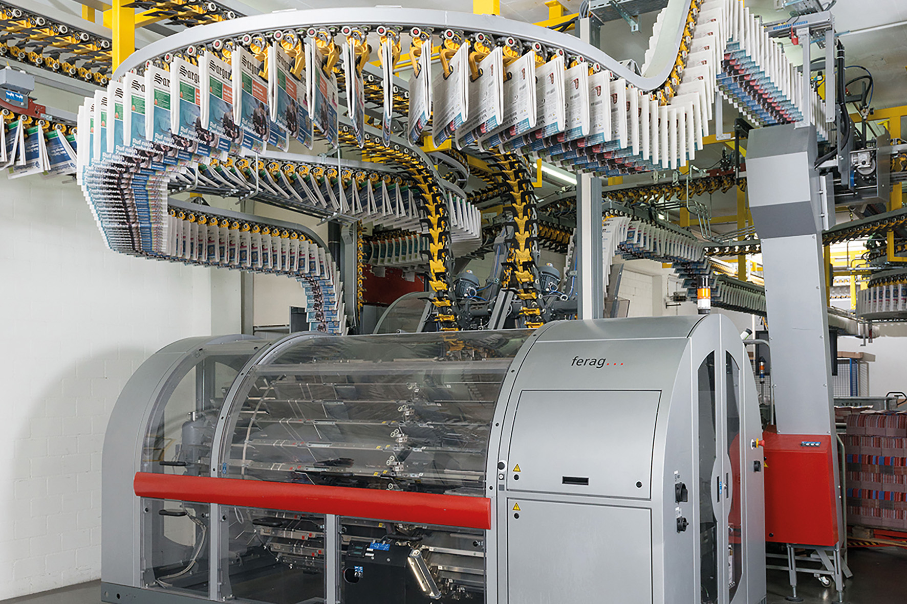 Mit der RollSertDrum bietet Ferag leistungsfähige rotative Einstecktechnik in kompakter Bauweise, deren Kapazitäten bei Bedarf lei Mit der RollSertDrum bietet Ferag leistungsfähige rotative Einstecktechnik in kompakter Bauweise, deren Kapazitäten bei Bedarf lei