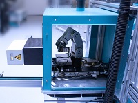 Lasermarkierstation mit Roboter Lasermarkierstation mit Roboter