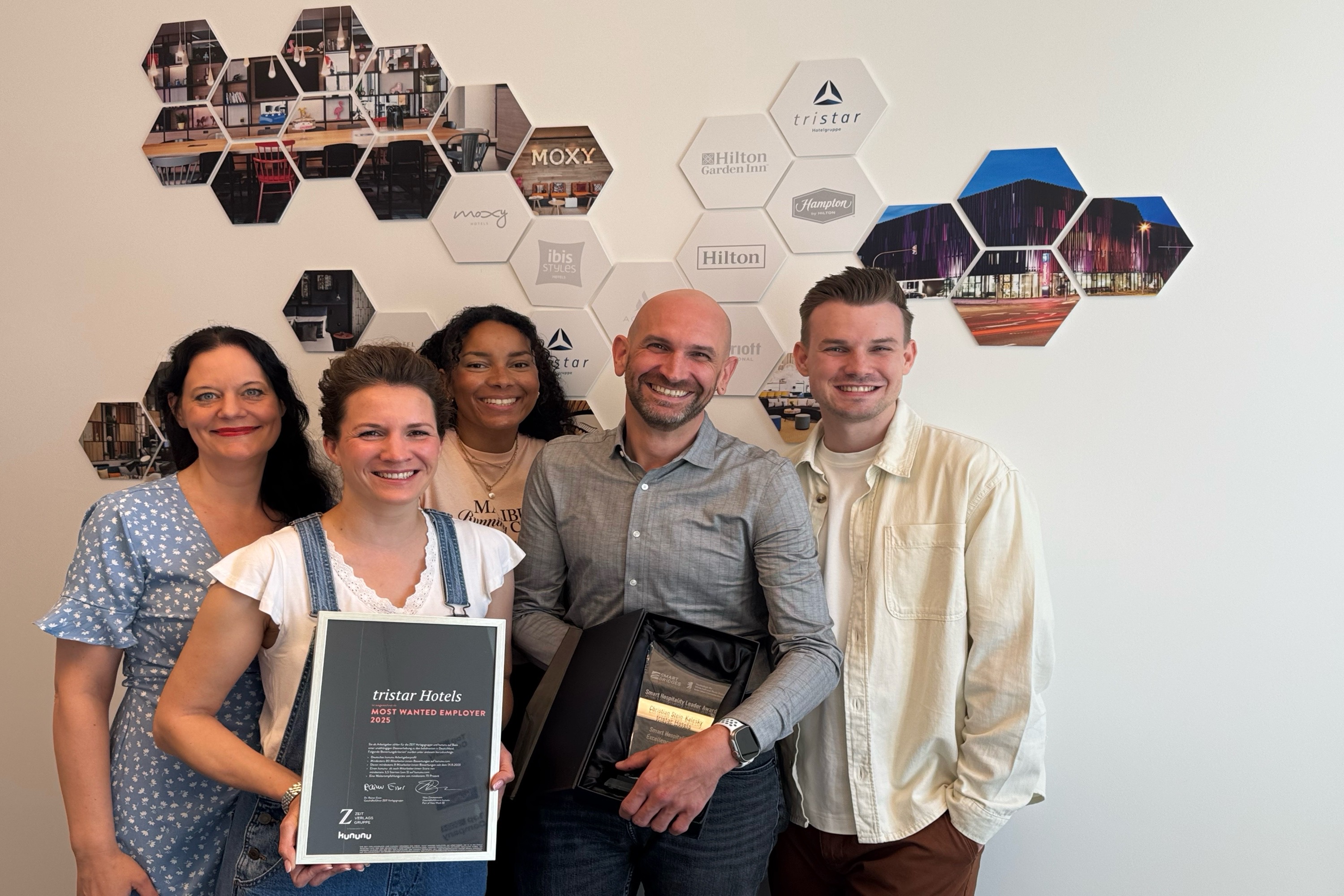 Christian Stein-Kalesky, Head of People & Culture Europe bei der tristar Hotelgruppe und Team.