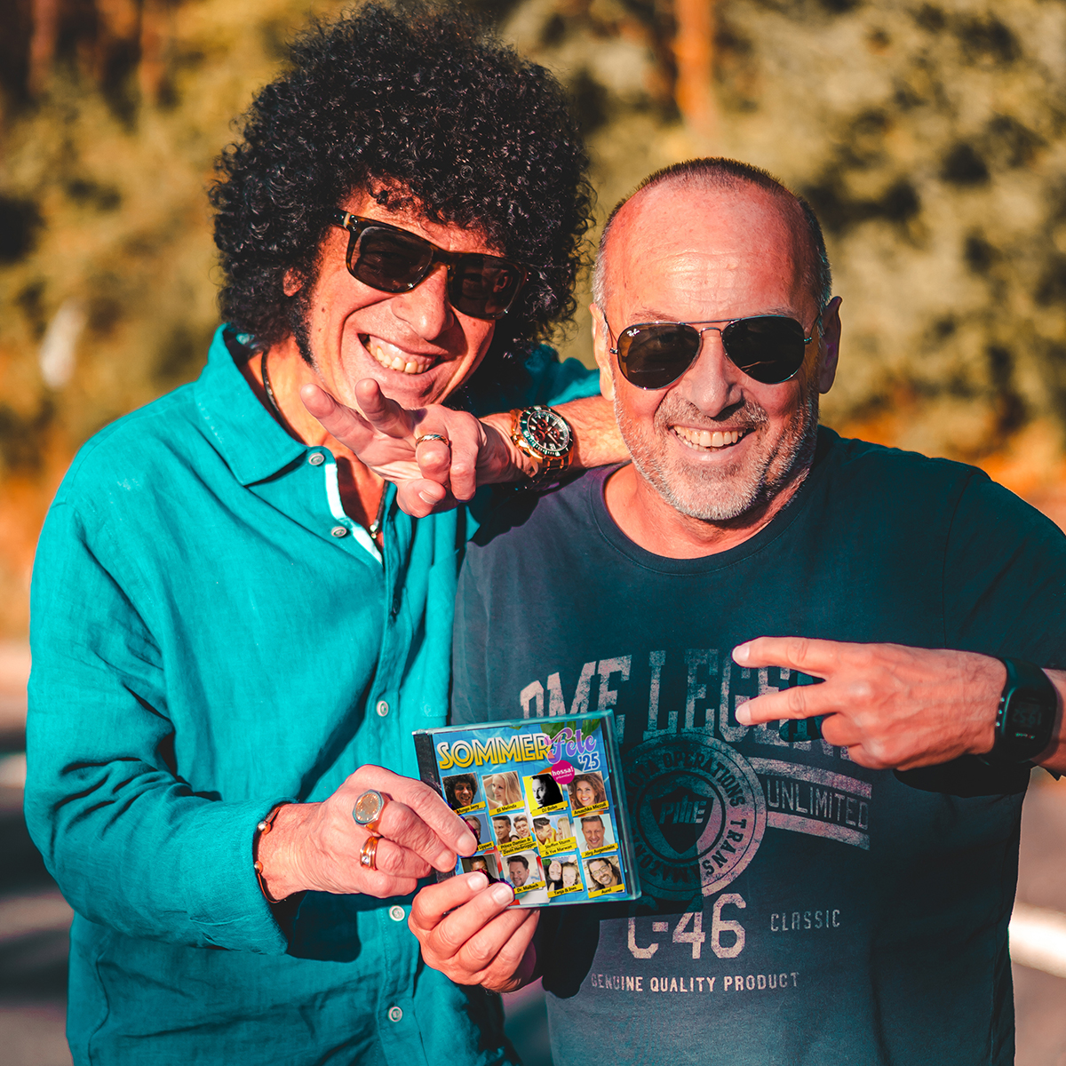Pop-Legende Ray Dorset (a.k.a Mungo Jerry) und 7us media group CEO Hans Derer präsentieren die Pop-Legende Ray Dorset (a.k.a Mungo Jerry) und 7us media group CEO Hans Derer präsentieren die