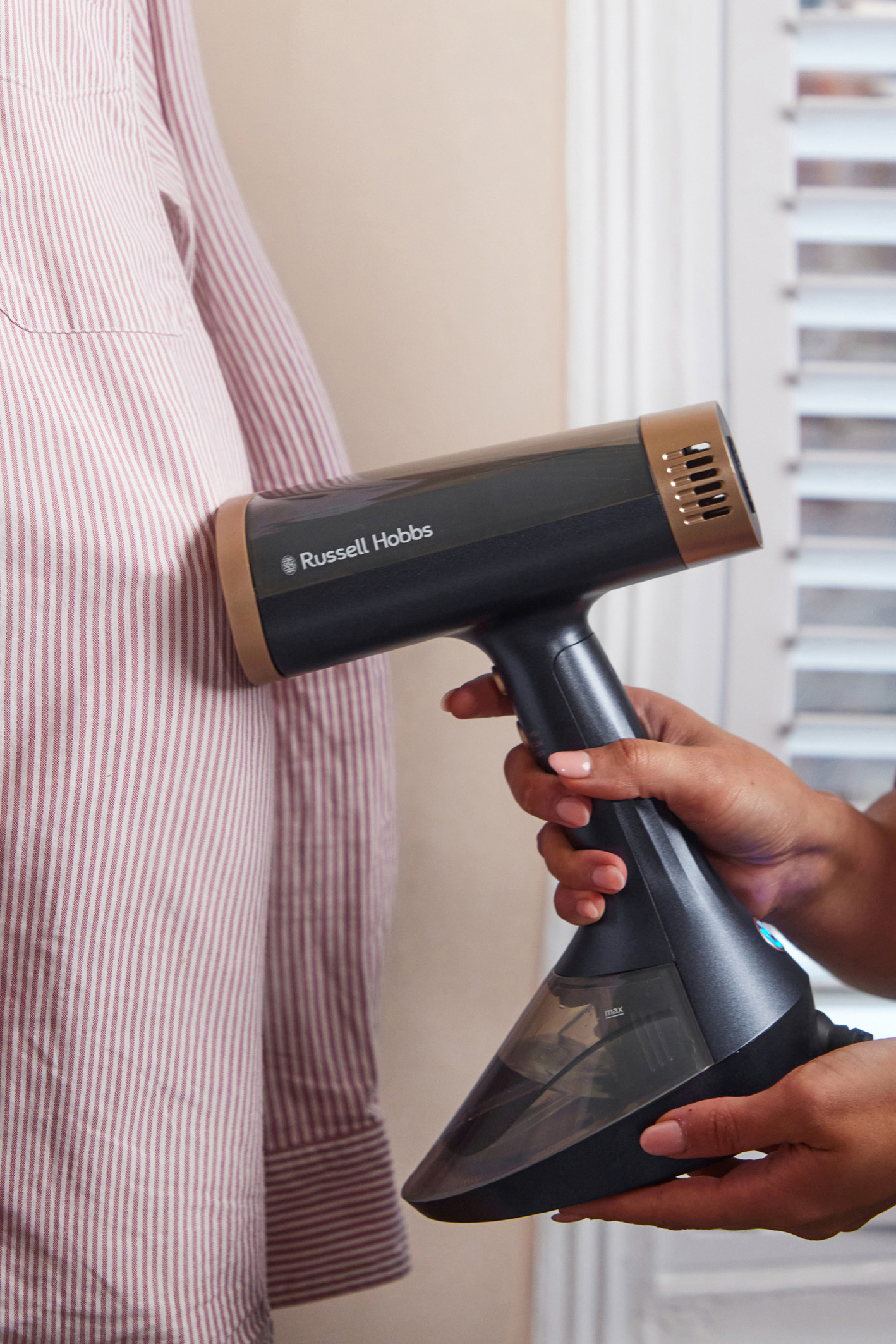 Russell Hobbs Steam Genie VacuSteam Dampfbürste (Bildquelle: Russell Hobbs) Russell Hobbs Steam Genie VacuSteam Dampfbürste (Bildquelle: Russell Hobbs)