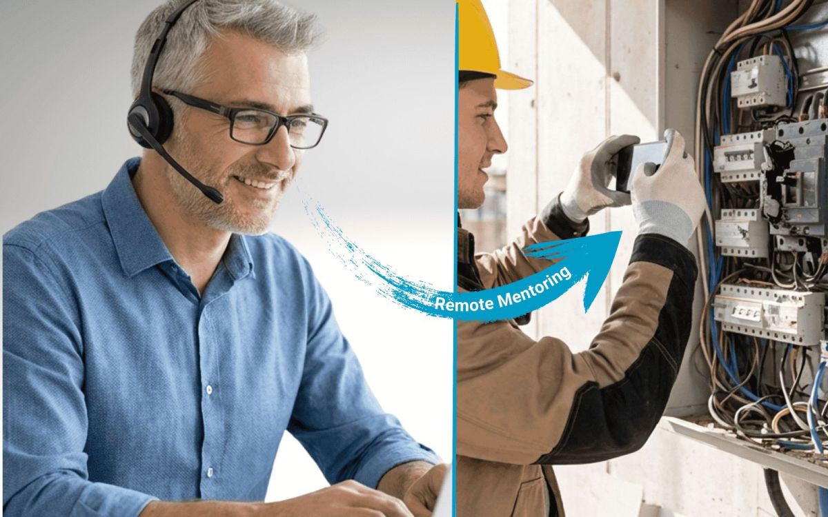 Service Techniker im Büro unterstützt Jung-Mitarbeiter per Video-Support - ohne Anfahrt (© tele-LOOK)