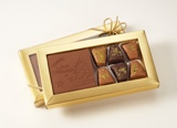 Baumkuchenspitzen und ein individuell geprägtes Schokologo / Foto: Schokologo Baumkuchenspitzen und ein individuell geprägtes Schokologo / Foto: Schokologo
