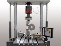 Ermüdungsprüfung an einem Zahnrad mit einer servo-hydraulischen Prüfmaschine HB250 Ermüdungsprüfung an einem Zahnrad mit einer servo-hydraulischen Prüfmaschine HB250
