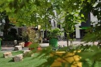 Oldenburger Stadtgärten: Boutique mit Vorgarten