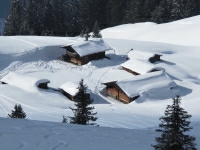 Tiefverschneites Hüttendorf - Feldalm Tiefverschneites Hüttendorf - Feldalm