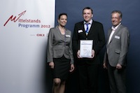 Hauptgewinner Dr. Gerold Monninger von Afriso mit Annette Großer und Michael Louis von Mindjet Hauptgewinner Dr. Gerold Monninger von Afriso mit Annette Großer und Michael Louis von Mindjet