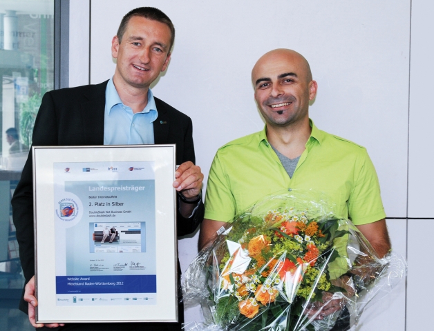 doubleSlash Geschäftsführer Andreas Strobel und Wolfgang Wagner von Columbus Interactive mit der Aus