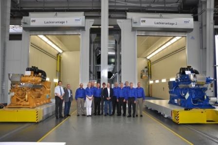 Anlässlich eines Managementmeetings von Caterpillar eingeweiht: die beiden neuen Lackieranlagen von Anlässlich eines Managementmeetings von Caterpillar eingeweiht: die beiden neuen Lackieranlagen von