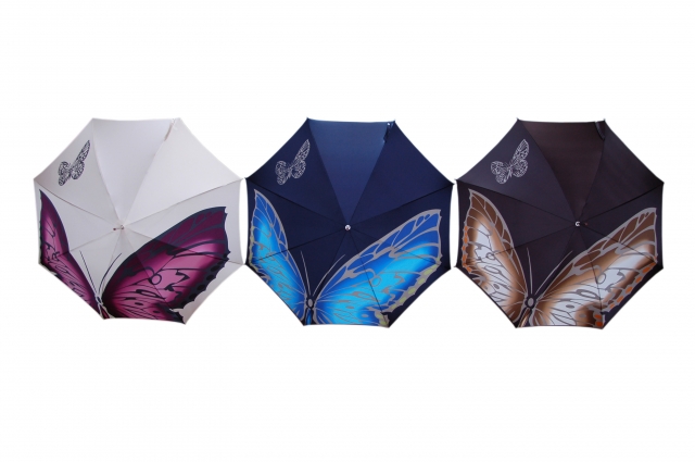 Butterfly von doppler in den Ecru-Lila, Blau-Türkis und Braun-Taupe Butterfly von doppler in den Ecru-Lila, Blau-Türkis und Braun-Taupe
