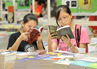 Junge Leser auf der Hongkonger Buchmesse. Foto: HKTDC. Junge Leser auf der Hongkonger Buchmesse. Foto: HKTDC.