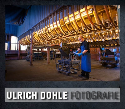Industriefotografie beim Schleifmittelhersteller - Gekonnte Verknüpfung von Mensch und Technik