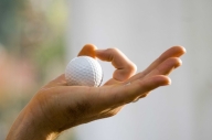 Yoga-Mudra mit Golfball