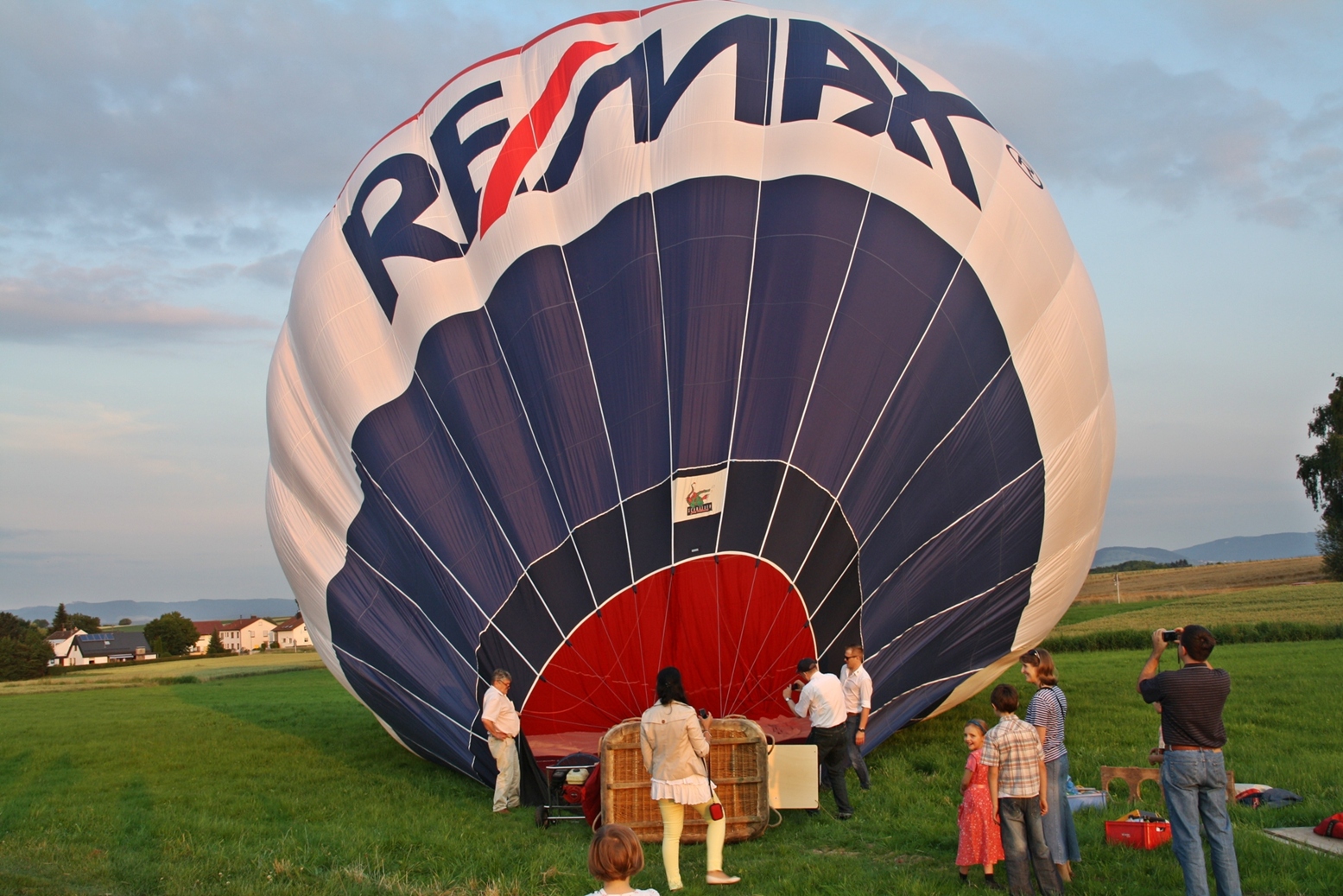 Das Markenzeichen von RE/MAX Das Markenzeichen von RE/MAX