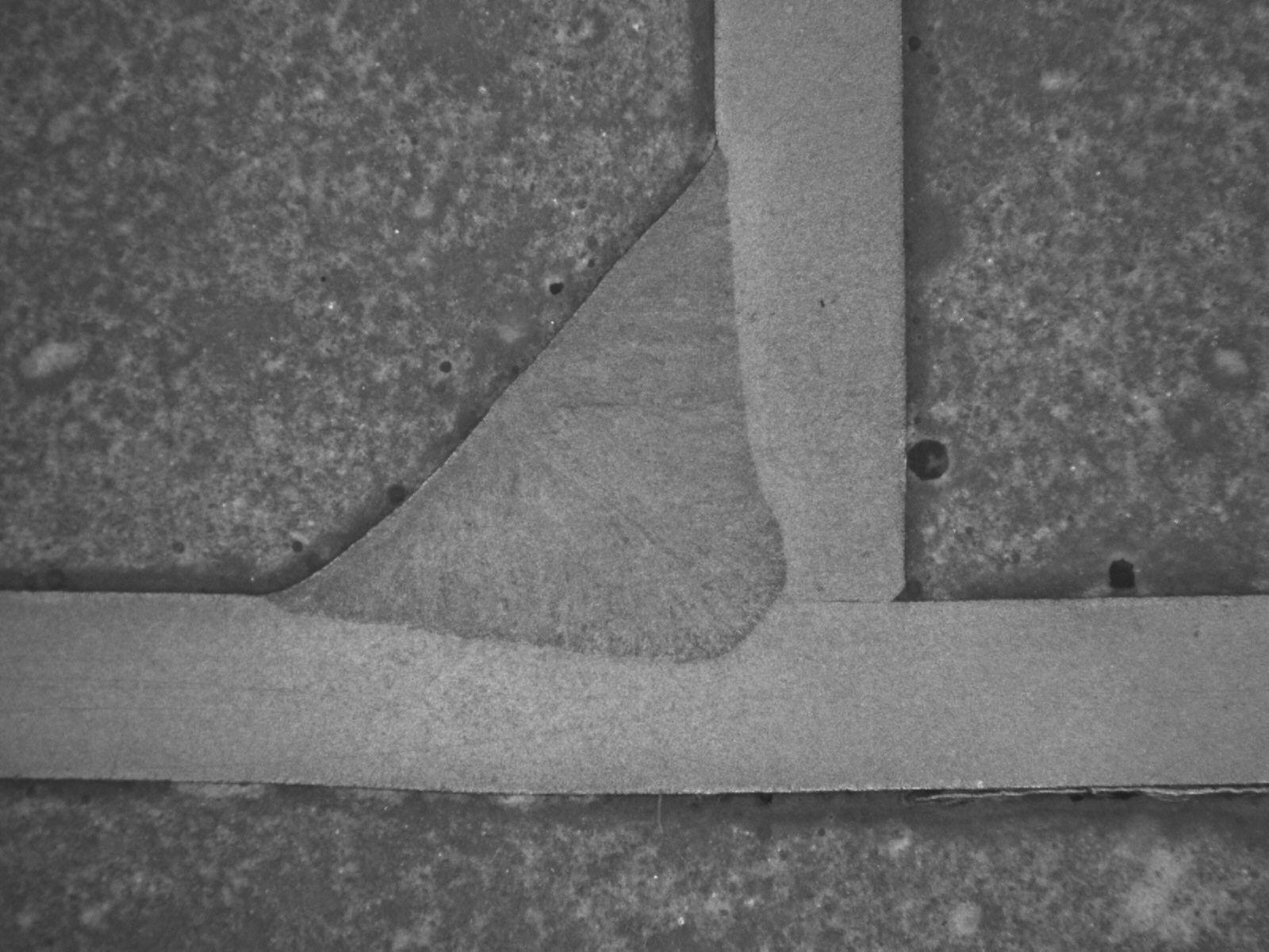 Schliffbild Schweißnaht KF-Puls: Stahl; t=2,0 mm; Kehlnaht, 15° fallend; 14 mm/s Schweißgeschwindigk